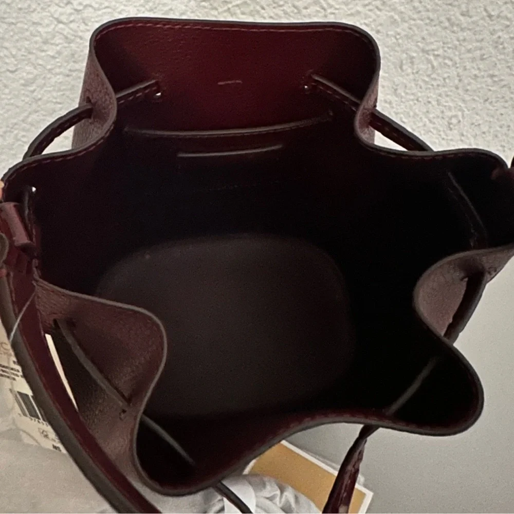 MICHAEL KORS 
Reed Medium Pebbled Leather Belted Bucket Messenger Satchel Crossb - Picture 12 of 16